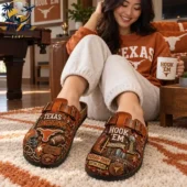 Woman wearing Texas Longhorns themed leather clogs