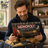 Tom Petty Power Rangers Collector's Edition Monopoly Board Game 3 Man holding a Tom Petty Collector Edition Monopoly game